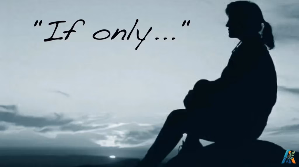Silhouette of a woman sitting on a rock looking at the sunset with the text "If only...".