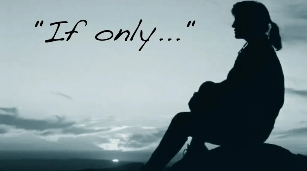 Silhouette of a woman sitting on a rock looking at the sunset with the text "If only...".