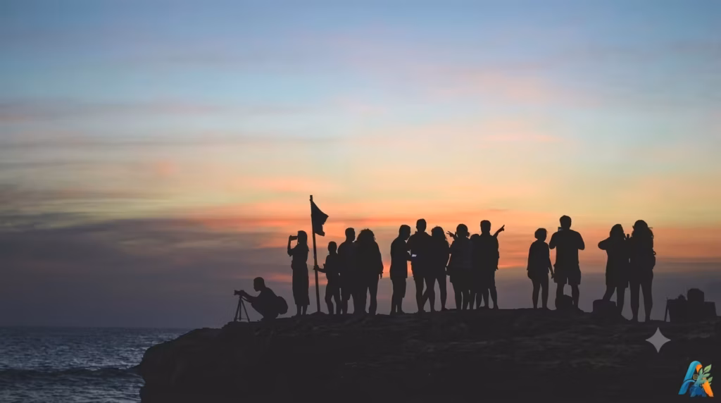 Siluet sekelompok orang berkumpul di tebing pantai saat matahari terbenam, ilustrasi dari file Orang-Orang-yang-Berebut.webp