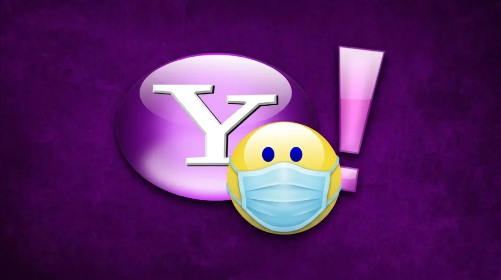 Logo ikonik Yahoo! berwarna ungu dengan latar belakang bertekstur, menampilkan emoji kuning yang sedang mengenakan masker wajah medis, sebagai ilustrasi konsep cara menyamar di Yahoo Messenger.