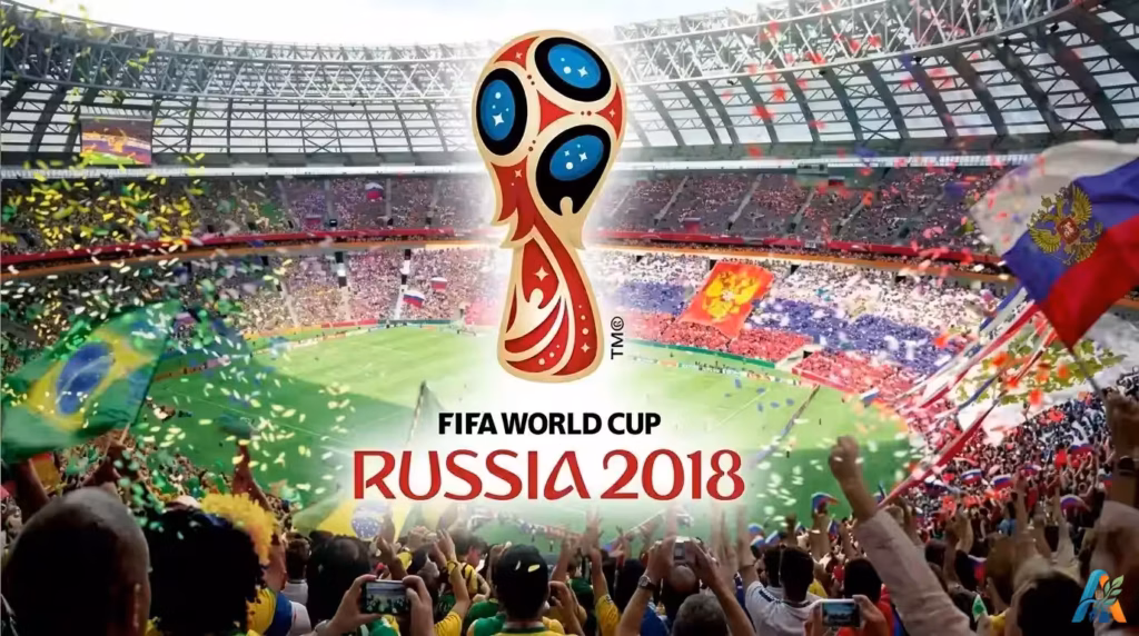 Logo resmi FIFA World Cup Russia 2018 berlatar belakang suasana kemeriahan suporter di dalam stadion sepak bola, dari file fifa-world-cup-russia-2018.webp