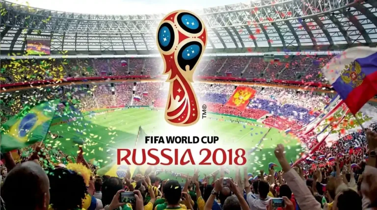 Logo resmi FIFA World Cup Russia 2018 berlatar belakang suasana kemeriahan suporter di dalam stadion sepak bola, dari file fifa-world-cup-russia-2018.webp