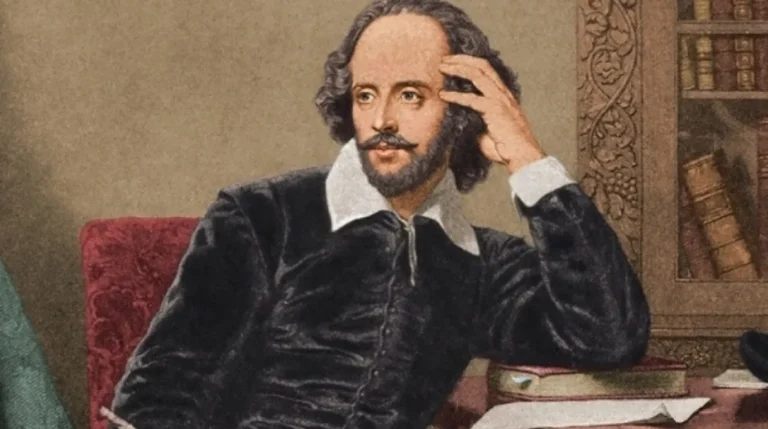 Lukisan potret William Shakespeare duduk memegang pena bulu ayam di samping meja kerja kayu